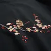 T-shirt a maniche corte ricamate in stile cinese T-shirt in cotone estivo originale da uomo con fiori di prugna
