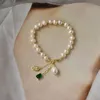 Bracelet de perles de millet d'eau douce Perle Placant 14K Gold Niche Design Girlfriends Tissé à la main Perles, Strands