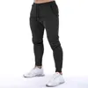 Hombres pantalones casuales joggers pantalones de algodón gimnasio entrenamiento pista transpirable músculo fitness corriendo slim fit cónico pantalón 211112