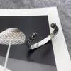 Top luxe ontwerp verzilverde armband retro modeontwerp tijgerletter armband opening verstelbare sieraden aanbod nrj linka