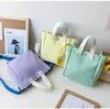 DHL50pcs sacs à bandoulière femmes toile trapézoïdale en forme de bonbon couleur frais grande capacité moraillon sac de messager