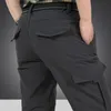 New Men's Winter Thick Fleece Warm Stretch Cargo Pants Military SoftShell Waterproof Casual Tactical Trousers Plus Size 4XL 211201