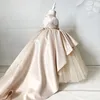 Härlig champagne Backless Flower Girl Dresses Boll Gown Pearls Satin Golvlängd Tulle Lilttle Barn Födelsedag Pageant Wedding Gowns Party Dress