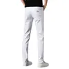 Męskie jesienne dżinsy czyste białe bawełniane elastyczne małe stopy Slim fit koreańskie proste spodnie