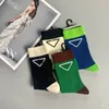 2021 P triangle leather label black and white color tube socks college design fashion brand couples with simple 4 color a37078937