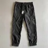 2022 SS Metal Nylon Hommes Pantalons One Lens Logo Poche zippée Pantalon mâle Survêtement extérieur Pantalon de jogging décontracté de haute qualité267O3208928