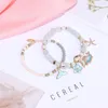 Elo Cadeia Estrela Do Mar Doce Estilo Étnico Feminino Menina Flor Corda Elástica Pulseiras Baleia Cauda Dupla Camada Bangles Inte22