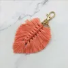 Bohème plage clés chaînes gland porte-clés fête faveur cadeaux porte-clés tissé à la main feuille sac accessoires corde feuille européenne américaine pendentif art artisanat B7736