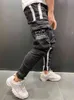 Män stretchy smal passform pocket jeans 2021 mode casual stripe tårar patchwork hip hop sweatpants europeisk stor storlek g0104