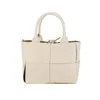 NXY Evening Bags Simple Fashion Fritid 2022 Ny handväska Stora kapacitet Solid Färg Cowhide Woven Child Mor Tote Bag Diagonal Cross Bag 220211