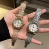 Orologi di marca Donna Donna Ragazza Orologio da polso di lusso in acciaio al quarzo con cinturino in metallo stile cristallo colorato Di32