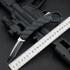 Ny högkvalitativ automatisk taktisk klo kniv D2 svart oxid + trådteckning (tvåton) tanto punktblad Zn-al legering handtag karambit med nylonskede