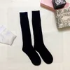 Designer femmes bas luxe longue casual rue lettre impression chaussettes filles mode sexy net gaze mince tube socking229O