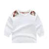 T-shirt en coton pour enfants, de haute qualité, à la mode, décontracté, pour garçons et filles, chemise à bascule, col rond, manches longues, hauts blancs, printemps 2022