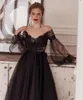 Robe de bal noire à manches longues bouffantes, effet d'illusion, col rond, en dentelle, longueur thé, robe de soirée en Tulle, avec nœud, 6625839