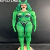 зеленый костюм комбинезон