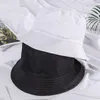 Chapeaux à large bord 2021 Chapeau de pêcheur de base d'été Double peut porter pour les femmes Sunhat Bucket Casquette de pêche en gros