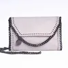 Leaning across all size small hand handshake mini designer bags famous female brand names stella mcartney falabella bags