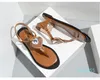 Römische Schuhe, herzförmige Strass-Verschluss, flache Hausschuhe, Sandalen mit Clip-Toe, rutschfeste Sandalen, berühmte Designer-Damen, Damenmode Co