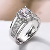 Huitan高品質シルバーメッキ女性結婚指輪ラウンドキュービックジルコン4爪デザインプロポーザルエンゲージメントリングクラシックジュエリーx0715
