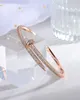 Donia Jewelry Luxury Bangle Nail Armband Överdriven Titanium Steel Micro-Inlaid Zircon-gåva från europeiska och amerikanska modedesigner med låda