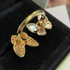 Örhängen Halsband Kosmikchiska Kvinnor Smycken Satser Bow Diamond Electroled 18K Gold White Butterfly Double-Butterfly Ring