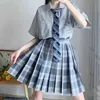 Black Gothic Pleated Skirts Women Japanese School Uniform High Waist Sexy Cute Mini Plaid Skirt JK Students Clothes 210708