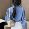 Haak holle kant stiksels Koreaanse stijl blouse vrouwen sexy bladerdeeg mouw stand-up kraag bottoming thin shirt 12731 210415