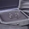 Boucles d'oreilles en argent sterling 925 bijoux plaqués or 18 carats avec boîte pour femmes hommes élégant goujon en forme de vague erreur