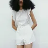 Za wzburzyć teksturowane hafty krótkie kombinezony kobiety sexy backless biały lato piórka kobieta elegancki ażurowe haftowane pary 210602