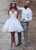 breve mini abiti da sposa