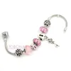 Charm armband 6st ankomst bröstcancer medvetenhet rosa band smycken europeisk murano glas pärla hjärta lås nyckel armband