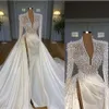 2022 Luxury Bling Mermaid Wedding Dresses Deep V Neck Illusion Pearls Crystal High Side Split Arabic Satin Bridal Gowns Robe de mariée Plus Size Long Sleeves