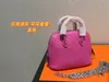 2022 Kvinnor Fashion Classic Premium varumärke Evening Bag Shell Bag Axelväskor Handväskor Toppkvalitet Enkel och mogen storlek: 12 *9