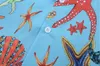 Heren Zomer Korte Mouw Shirt Mannen Designer Stylist Casual Shirts Mode Turn Down Collar Starfish Print Street Losse Vrije tijd Veelzijdig Aziatisch Maat M-3XL