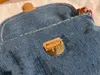 Bolso de vaquero de gama alta para bolso de hombro de mezclilla antiguo bolsos de bordado de axila de Baguette Vintage