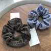 Elastici delicati lucidi Capelli di lusso femminili Anello Porta coda di cavallo Cravatte per capelli Plaid da donna Copricapo nero di moda