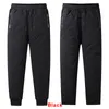 Inverno zip bolsos engrossar velo sweatpants homens corredores preto cinza para baixo algodão calças quentes masculino à prova de água calças térmicas 7xl 220212