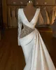 Arabic Aso Ebi 2021 Mermaid Beaded Crystals Wedding Gowns Deep V-neck Long Sleeves Satin Bridal Dresses ZJ475