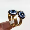 Hele 25 stuks lot Vintage Blue Evil Eye RVS Gouden Punk Ring Vrouwen Accessoires Cadeau Mannen Retro Party Ring Unique27836461627