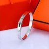 men bracelet women bangle diamonds bracelet Stainless steel jewelry is simple and fashionable charm womens button High quality couple gift woman Bracelets