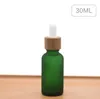 Frasco cuentagotas transparente esmerilado de 30 ml con tapa de bambú Botellas de vidrio de aceite esencial Frascos de perfume verde escarcha SN2631