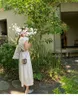 コットンリネン背中の無地のドレス女性の2022夏のバブルスリーブ薄いA線の巾着ウエストを閉じる中長姿