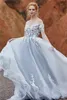 Svart bröllopsklänning Ny av axeln Kort ärm med spets Applique A-Line Sweep Train Sexig Bröllopklänning Vestido de Fiesta Largos de Gala 2022