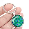 LLavero de Anime Esspoc, cabujón de cristal de pavo real genial, llavero para mujer, regalo para niña, llaveros de animales, llavero, bisutería al por mayor G1019