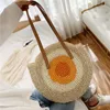 공장 아울렛 여성 핸드백 손으로 짠 여름 해변 가방 대용량 간단한 원형 패션 어깨 가방 여름 짚 해변 핸드백