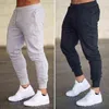 Heren Merkbroek Casual Zwart Wit met Print Jogger Werkkleding Joggingbroek voor jongens Sport Mode Streetwear Klassieke broek 220108