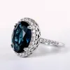 Anneaux de mariage Huitan charmant bleu CZ femmes accessoires de fête Bling gracieux bague d'éternité de mariée bijoux à la mode en gros