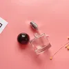 Bouteilles de parfum de parfum de forme ronde claire vide à fond épais 30 ml emballage de bouteille de pulvérisation en verre de parfum