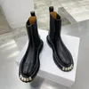 Black Elasticated chunky platform biker ankle boots leather Martin booties with notched sole heavy duty luxury designers brands shoes